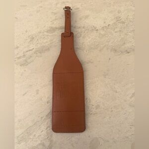 Chateau Montelena Winery Leather Luggage Tag in the shape of a Wine Bottle